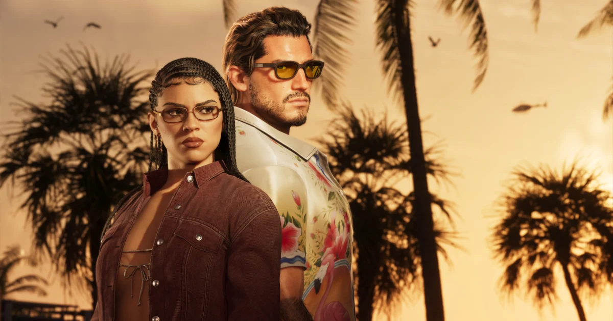 Jason et Lucia, les deux protagonistes de GTA VI, dos à dos devant un coucher de soleil sur fond de palmiers